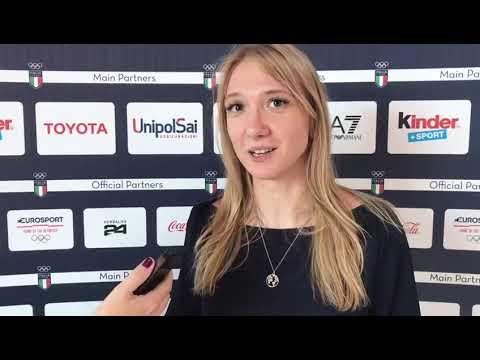 Elizaveta Kuzenkova speaks during a visit to the Italian Olympic Committee